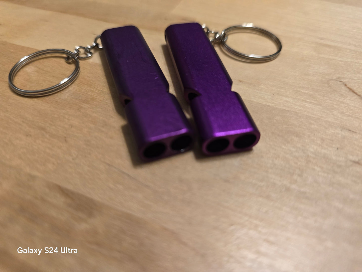 Purple safety whistle