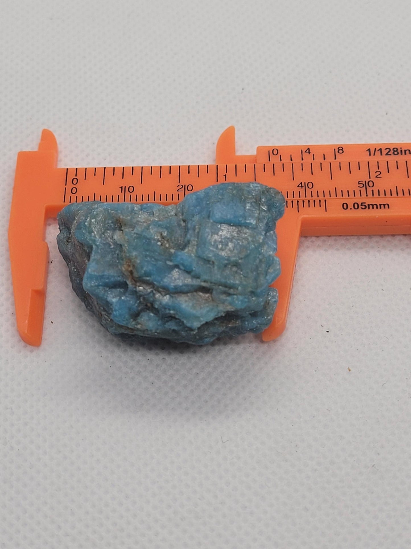 Blue apatite rough polished